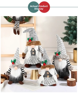 Close-up of Nordic Christmas gnomes with grey knitted hats and faux fur beards set