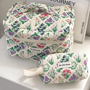 Quilted floral makeup bag set with small flowers and soft cotton handle strap
