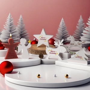 Christmas themed white and red ornaments set with reindeer, star, and angel shapes