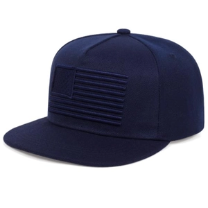 Detail of 3D embroidery and stitching on the navy blue American flag snapback hat