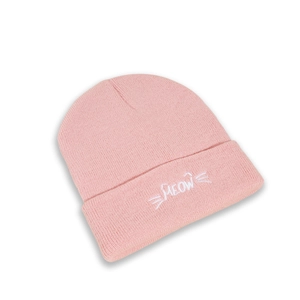 Detail of soft pink knit beanie featuring white MEOW lettering and cat whisker embroidery