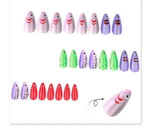 Detailed view of 3D cat-eye stiletto press-on nails with ocean-inspired fish-eye texture