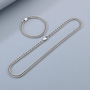 Ensemble collier et bracelet pour homme en maille gourmette bicolore à fermoir géométrique