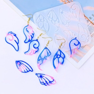 DIY silicone mold for angel wing earrings and resin jewelry with blue pink gradient effects