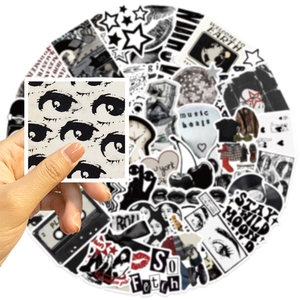 Close-up of waterproof Y2K black and white aesthetic stickers for scrapbooking and DIY