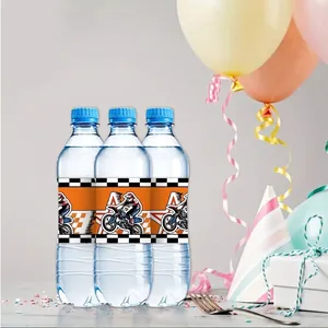 Detail of motocross party water bottle labels with dirt bike graphics and racing checkers