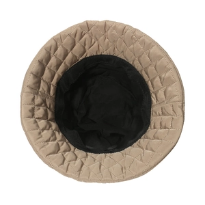Top view of quilted khaki bucket hat showing interior lining and rhombic stitching details