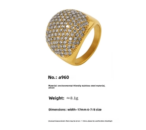 Detail showing 17mm wide golden dome ring with micro-pave cubic zirconia setting