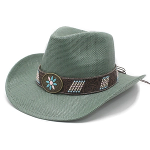 Sage green woven western cowboy hat featuring an embossed brown band and sunflower metal buckle