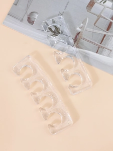 Macro detail of soft silicone toe separators with glitter for pedicure nail art
