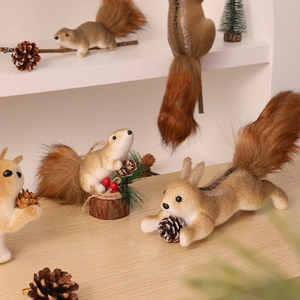 Detailed view of plush squirrel figurines with fluffy tails and artificial pine cones
