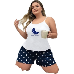 Women's pajama set featuring Good Night star moon tank top and navy star printed shorts
