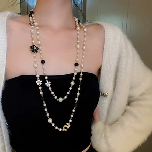 Double-layer handmade pearl necklace with black white flowers and gold number 5 pendant