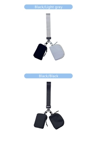 Close-up of waterproof nylon wristlet pouches with secure metal hooks and zipper details