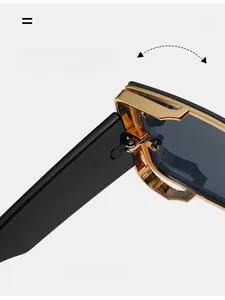 Close-up of durable golden metal hinges on stylish square sunglasses with wide temples
