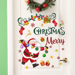Christmas snowflake star wall stickers on white door with Santa Claus holiday decor
