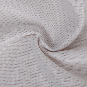 Macro shot of breathable white mesh fabric with honeycomb texture for sports headwear