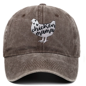 Close-up of chicken mama embroidery on vintage washed cotton baseball cap texture