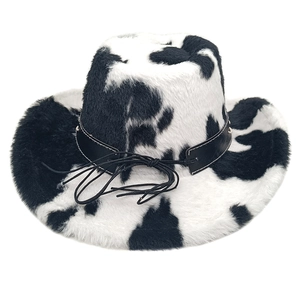 Detail of cow print western cowboy hat with black leather band and silver rivet accents