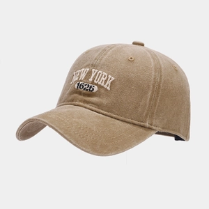 Detail of vintage washed khaki baseball cap with New York 1625 3D embroidery