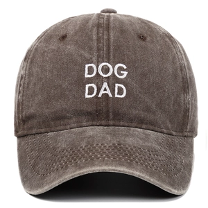 Front view of a distressed vintage brown baseball cap with DOG DAD embroidery
