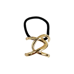 Close-up of golden interlocking alloy hair tie with a black high-elastic rope