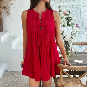 Women's summer sleeveless red pleated mini dress with front tie and keyhole detail