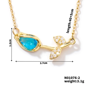 Detailed view of tulip pendant dimensions with blue stone and gold chain length info