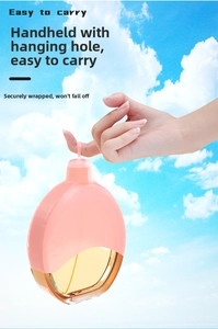 Pink silicone sleeve for travel bottles featuring a handy finger hole for easy carrying