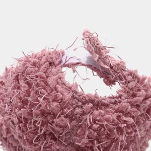 Macro detail of plush smoky pink baseball cap showing soft texture and stitching quality