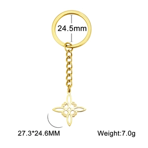 Macro shot of gold stainless steel keychain with Celtic knot pendant and dimensions info