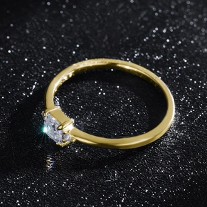 Elegant S925 sterling silver gold ring with square clear zircon on sparkling black background