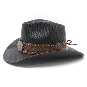 Detail of black woven cowboy hat featuring a brown leather band with vintage metal emblem
