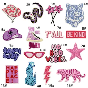 Set of 16 pink embroidered iron-on patches featuring cartoon animals and slogans