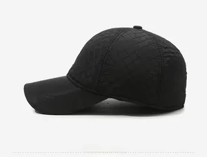 Side view of men's winter quilted baseball cap showing ear protection and windproof fabric
