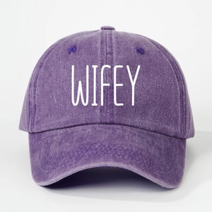 Detail view of purple washed cotton baseball cap with white WIFEY embroidery lettering