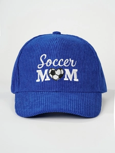 Macro detail of blue corduroy texture and white Soccer Mom embroidery on baseball cap