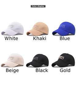 Six different colors of baseball caps with 3D Numax embroidery on a white background