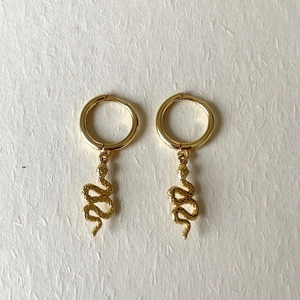 Irregular golden S925 silver snake drop earrings with textured tassel details