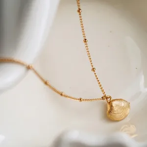 Elegant gold seahorse shell pendant necklace with beaded titanium steel chain for women