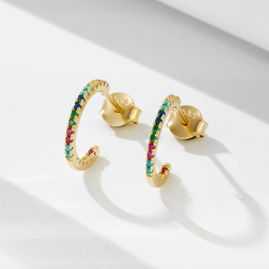Close-up of S925 silver C-shape gold earrings featuring colorful pavé zircon stones