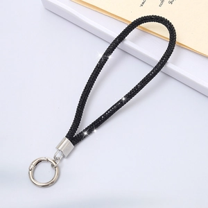 Detail of elegant black rhinestone chain strap with silver spring ring clasp