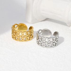 Detailed close-up of hollow chain link rings in gold and silver finish with open band