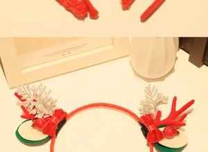 Detail of red Christmas reindeer antler headband with glitter and soft faux fur decor