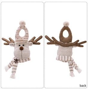 Detailed front and back view of a plush reindeer Christmas decoration with striped scarf