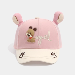 Detail of pink mesh baseball cap with 3D ears and cartoon puppy patch for kids