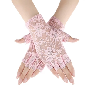 Close-up of pink lace fingerless gloves with elegant floral patterns and scalloped wrist edge