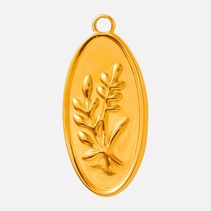 Detailed close-up of golden oval stainless steel pendant with engraved floral patterns