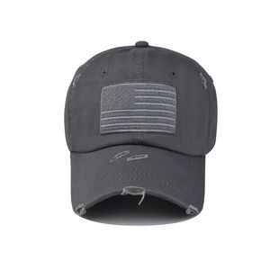 Close-up of distressed dark grey cotton baseball cap with American flag patch detail