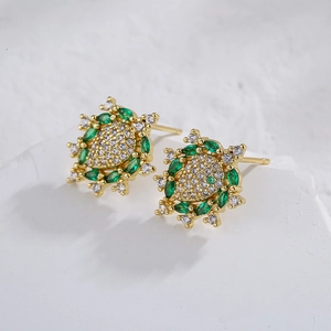 18K gold plated sunflower earrings featuring green marquise gems and clear cubic zirconia